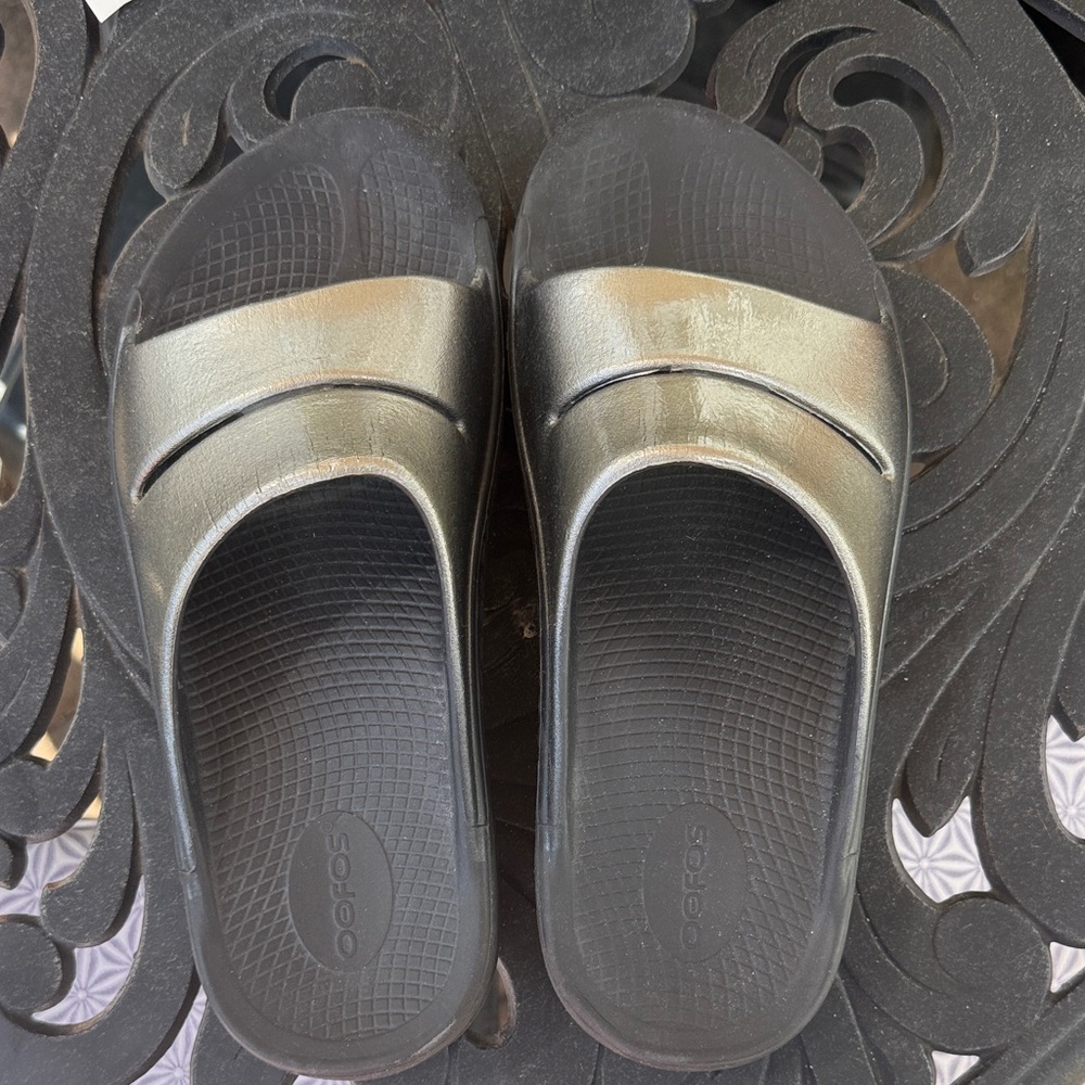 OOFOS Black and Metallic Slide Sandals